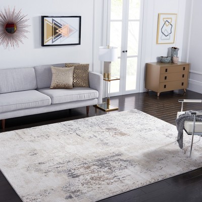 Ivory and Grey Abstract 8' x 10' Synthetic Area Rug