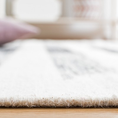 Handmade Black and Ivory Wool Flat Weave 4' x 6' Area Rug