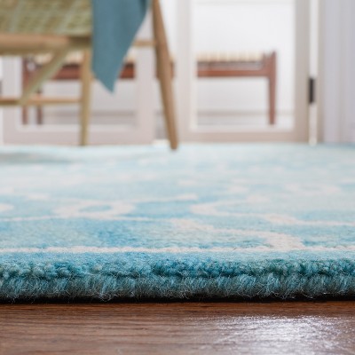 Turquoise and Ivory Hand-Tufted Wool Area Rug 4' x 6'