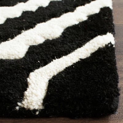 Handmade Black and Ivory Wool Tufted Square Rug