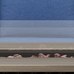 blue cushion/brown wicker