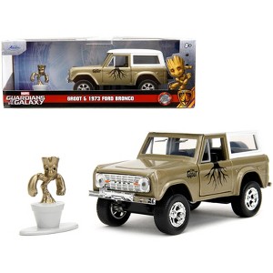 1973 Ford Bronco Gold Met. w/White Top & Groot Figure "Guardians of the Galaxy" "Marvel" Series 1/32 Diecast Model Car by Jada - 1 of 4