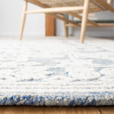 Blue and Ivory Hand-Tufted Wool Area Rug 5' x 8'