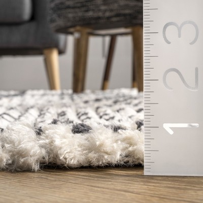 Ivory Geometric Reversible 8' x 10' Synthetic Area Rug