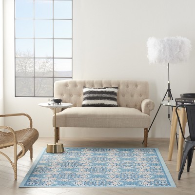 Blue Floral Synthetic Reversible 5' x 7' Area Rug