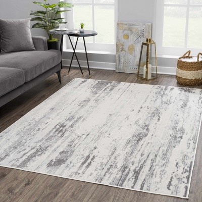 Gray and Ivory Abstract Medium Pile Synthetic Rectangle Rug 2' x 3'