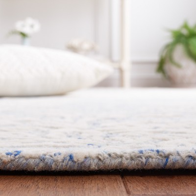 Handmade Blue Floral Tufted Wool Area Rug