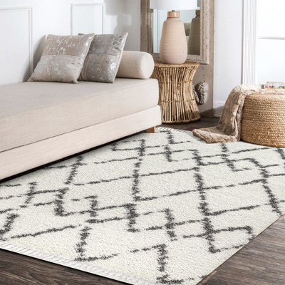 4' x 6' Grey and Ivory Synthetic Shag Area Rug