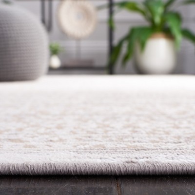 Beige and Ivory Hand-Knotted Synthetic Area Rug