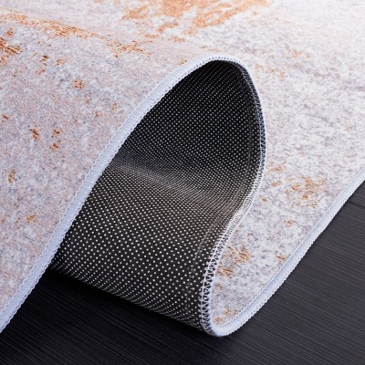 Gray and Rust Abstract Synthetic 4' x 6' Area Rug