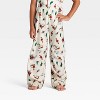 Toddler Grinch Print Long Sleeve Shirt and Pants Holiday Matching Family Pajama Set - Cream - 4 of 4