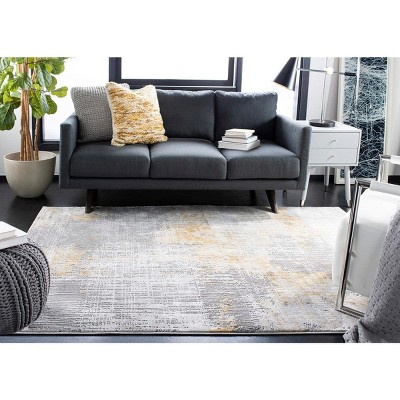 Grey and Beige Abstract Synthetic Area Rug 4' x 6'
