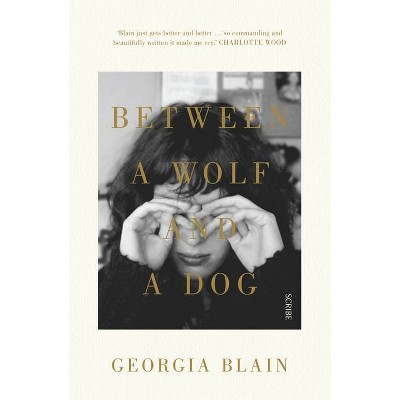 Between a Wolf and a Dog - by  Georgia Blain (Paperback)