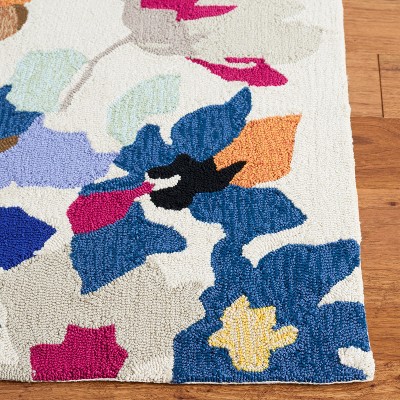 Ivory Multicolor Floral Synthetic Hand-Hooked Area Rug 3'6" x 5'6"