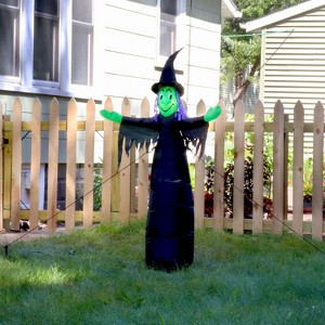 Sunnydaze Outdoor Wendolyn the Wicked Witch Self-Inflating Halloween Inflatable Yard Decoration with LED Lights and Built-In Fan - 5' - 1 of 4