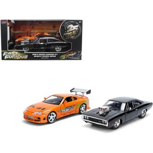 Dom's 1970 Dodge Charger R/T Black and Brian's Toyota Supra Orange