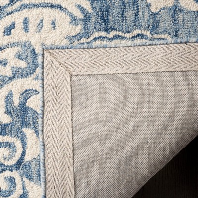 Blue and Ivory Hand-Tufted Wool 4' x 6' Area Rug