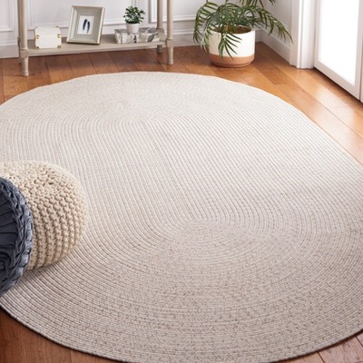 Handwoven Ivory Oval Braided Reversible Synthetic Rug