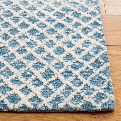 Ivory and Blue Hand-Tufted Wool Area Rug, 5' x 8'