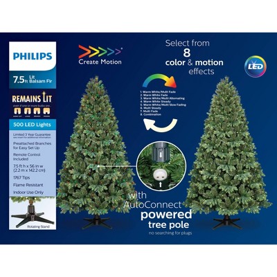 Snow flocked fraser fir christmas tree with chasing warm led lights