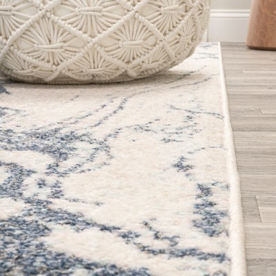 Blue and Cream Abstract 8' x 10' Synthetic Area Rug