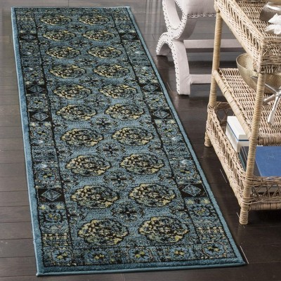 Blue Floral Motif Synthetic Runner Rug with Border Embellishment