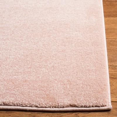 Enchanted Carousel 47" Round Pink/Ivory Synthetic Kids Area Rug