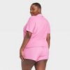 Women's Barbie Terry Cloth Short Sleeve Graphic T-shirt - Pink 3x