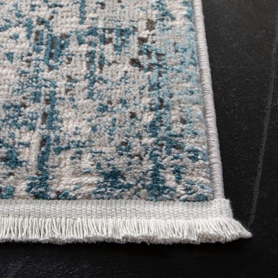 Abstract Blue Synthetic 59" Hand-Knotted Area Rug