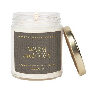 Sweet Water Decor Warm & Cozy 9oz Clear Jar Soy Candle - 1 of 3