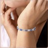 Hollywood Sensation Flower Cubic Zirconia Tennis Bracelet with Round Cut Sapphire Cubic Zirconia 7 Inches Gold - 2 of 3