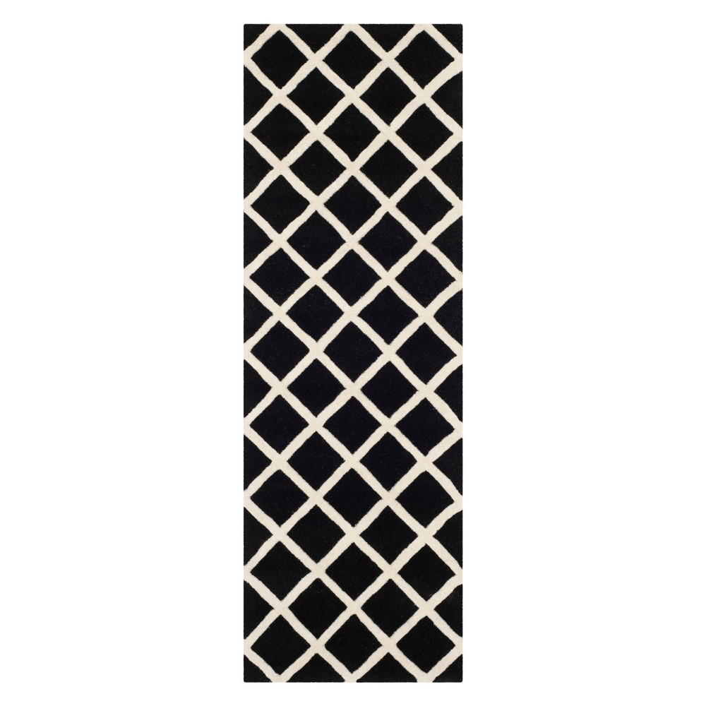 2'3inx7' Christy Geometric Tufted Area Rug Black/Ivory - Safavieh