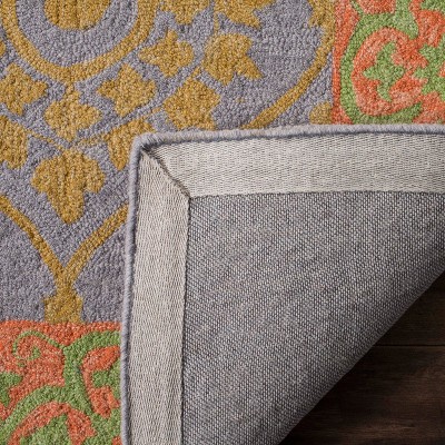 Ivory and Orange Floral Wool 8' x 10' Area Rug