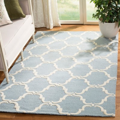 Blue and Ivory Hand-Tufted Wool 4' x 6' Area Rug