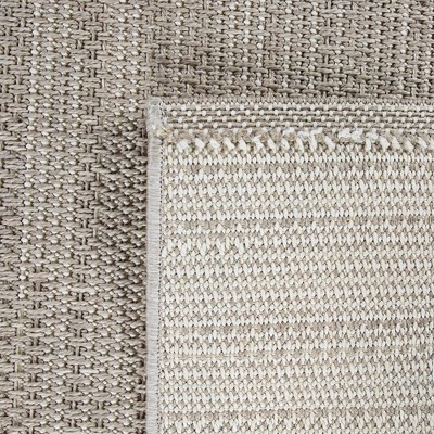 Beige Synthetic 8' x 10' Easy-Care Rectangular Indoor/Outdoor Rug