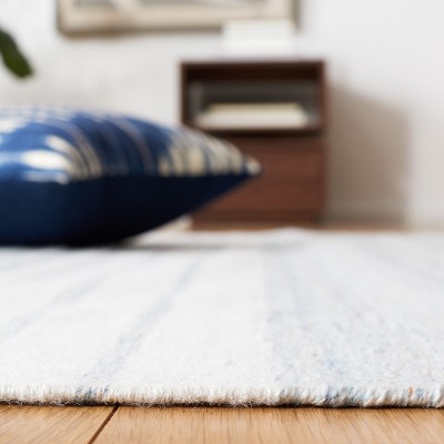 Handmade Light Blue and Ivory Wool Striped Area Rug, 5 ft. x 8 ft.