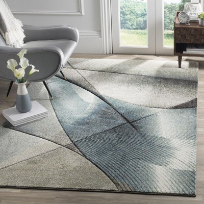 Grey and Teal Geometric Medium Pile Area Rug, 6'7" x 9'