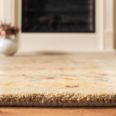 Hand-Tufted Elegance Round Blue Wool Area Rug, 5' x 8'