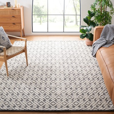 Handmade Black and Ivory Geometric Wool Area Rug, 9' x 12'