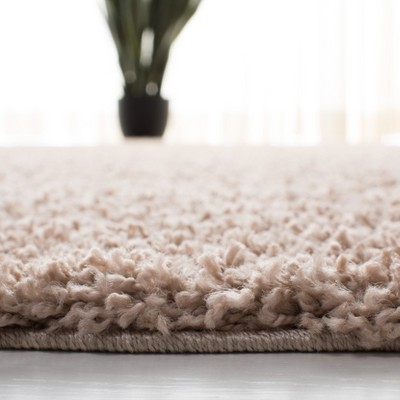 Beige 5'3" x 7'6" Synthetic Shag Area Rug