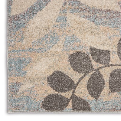 Ivory and Light Blue Floral Synthetic 5' x 7' Area Rug