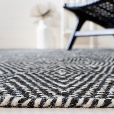 Black and Ivory Handwoven Wool Kilim Area Rug, 5' x 8'