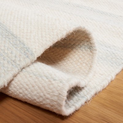 Elysian Light Blue and Ivory Handmade Wool 4' x 6' Area Rug