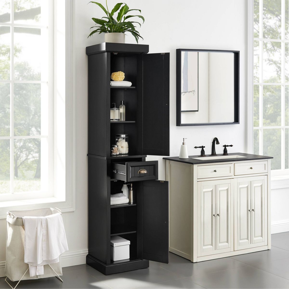 Open tall black storage cabinet showing shelves and interior storage