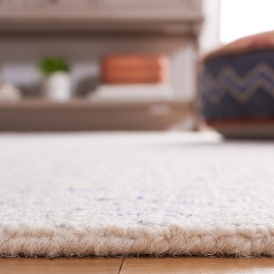 Ivory and Blue Handmade Wool Abstract Round Rug