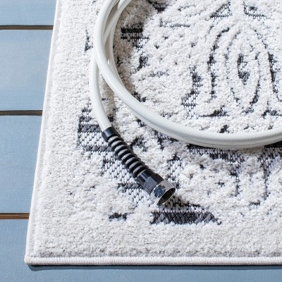 Ivory Geometric 6' x 9' Synthetic Indoor/Outdoor Area Rug