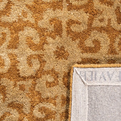 Hand-Tufted Gold and Beige Wool Oval Area Rug 7'6" x 9'6"