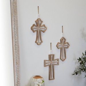Set of 3 Wood Biblical Carved Beaded Crosses Wall Decors with Rope Hanger Brown - Olivia & May - 1 of 4