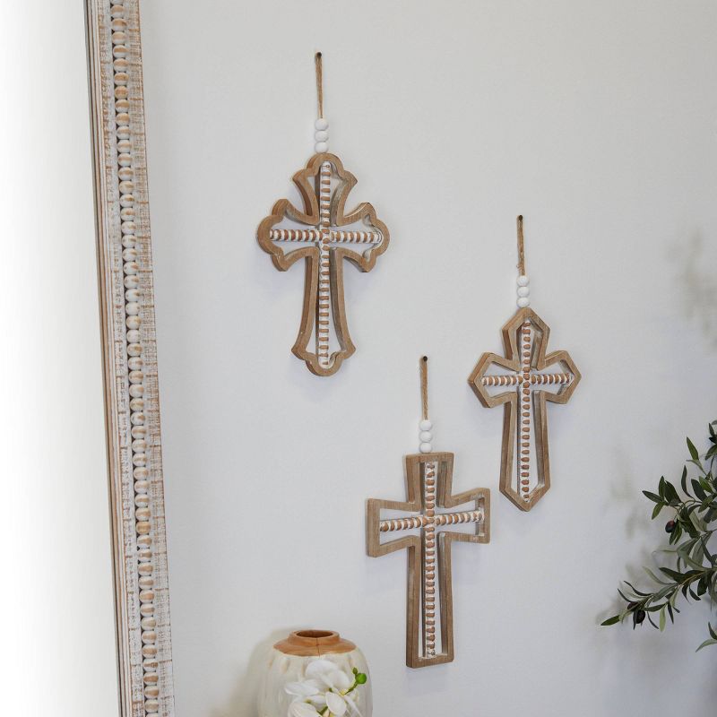 Set of 3 Wood Biblical Carved Beaded Crosses Wall Decors with Rope Hanger Brown - Olivia &#38; May, 1 of 7