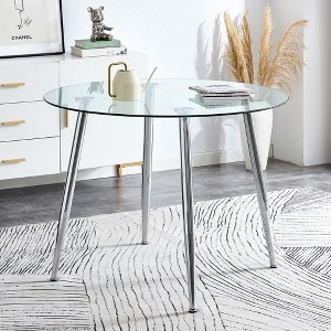 A glass tabletop with a diameter of 40 inches and a modern minimalist circular dining table - 1 of 4
